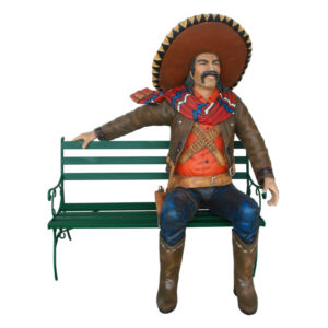 Mexicaanse cowboy op een bankje