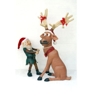 Elf trekkend aan rendier